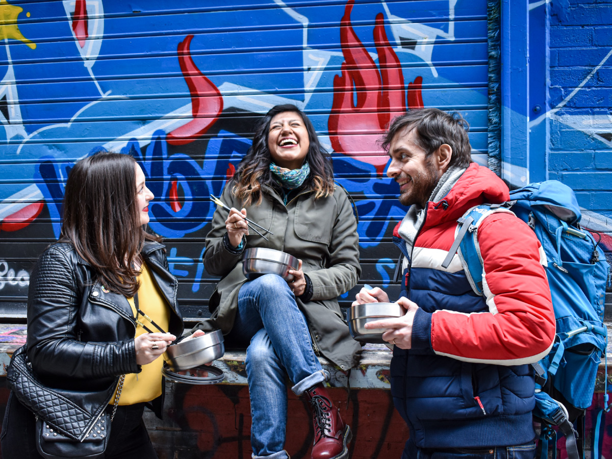 3 people enjoying food out of Inwit containers