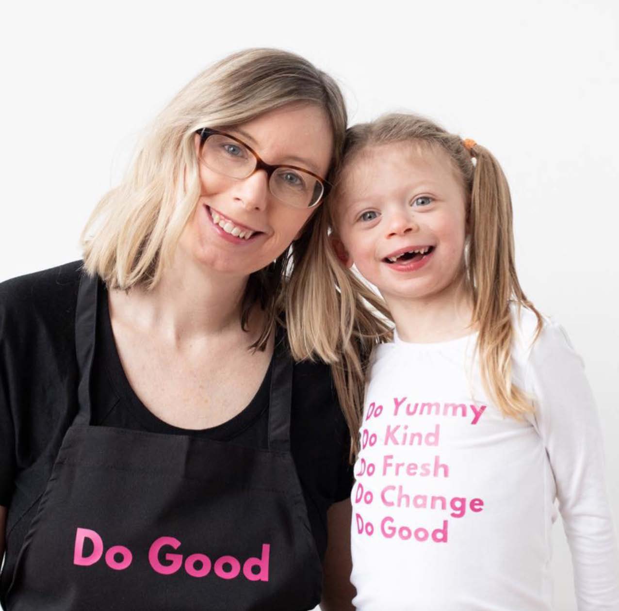 Mother and daughter smiling