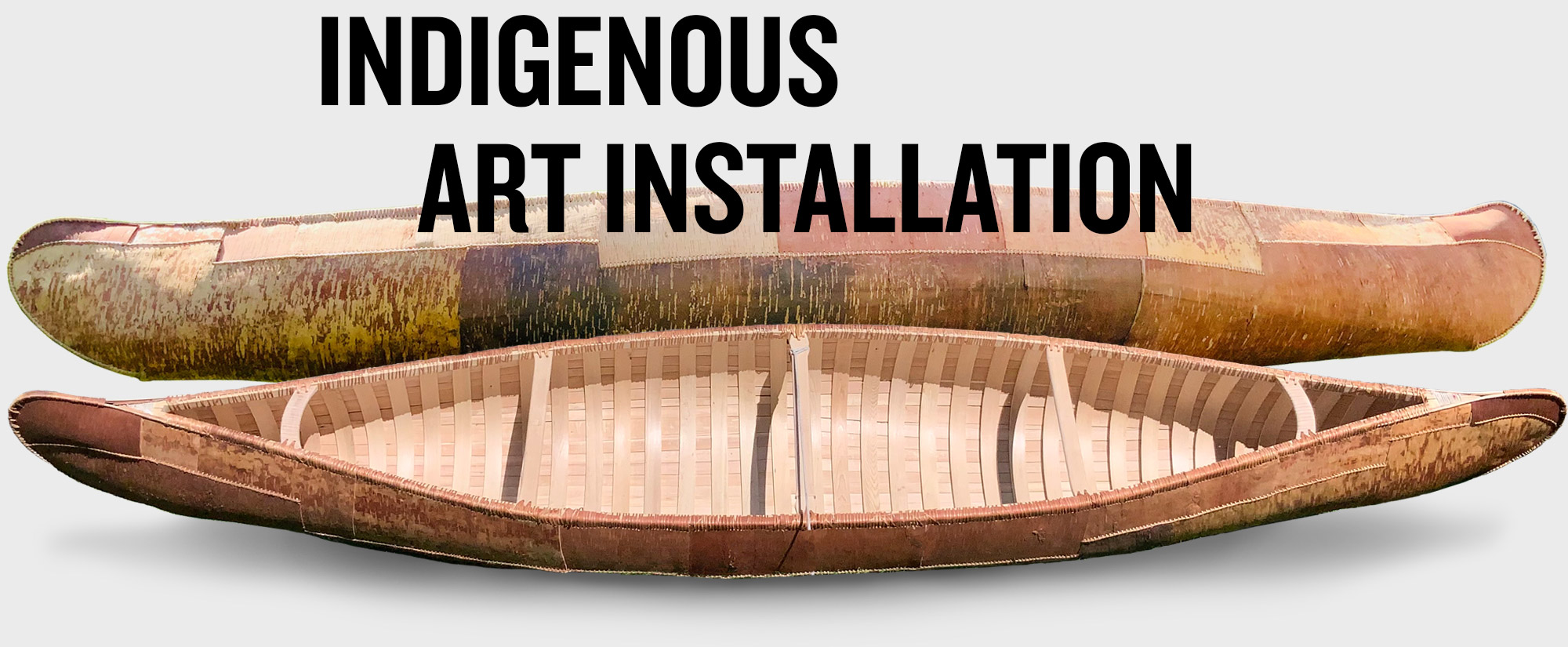 Indigenous Art Installation title with image of two finished canoes