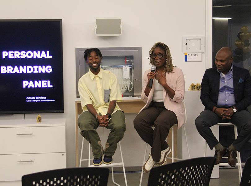 Three speakers at a panel discussion at black excellence summit 2023