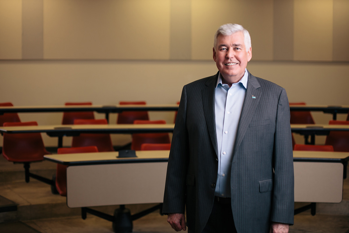 Dale Carl standing in a classroom at TRSM