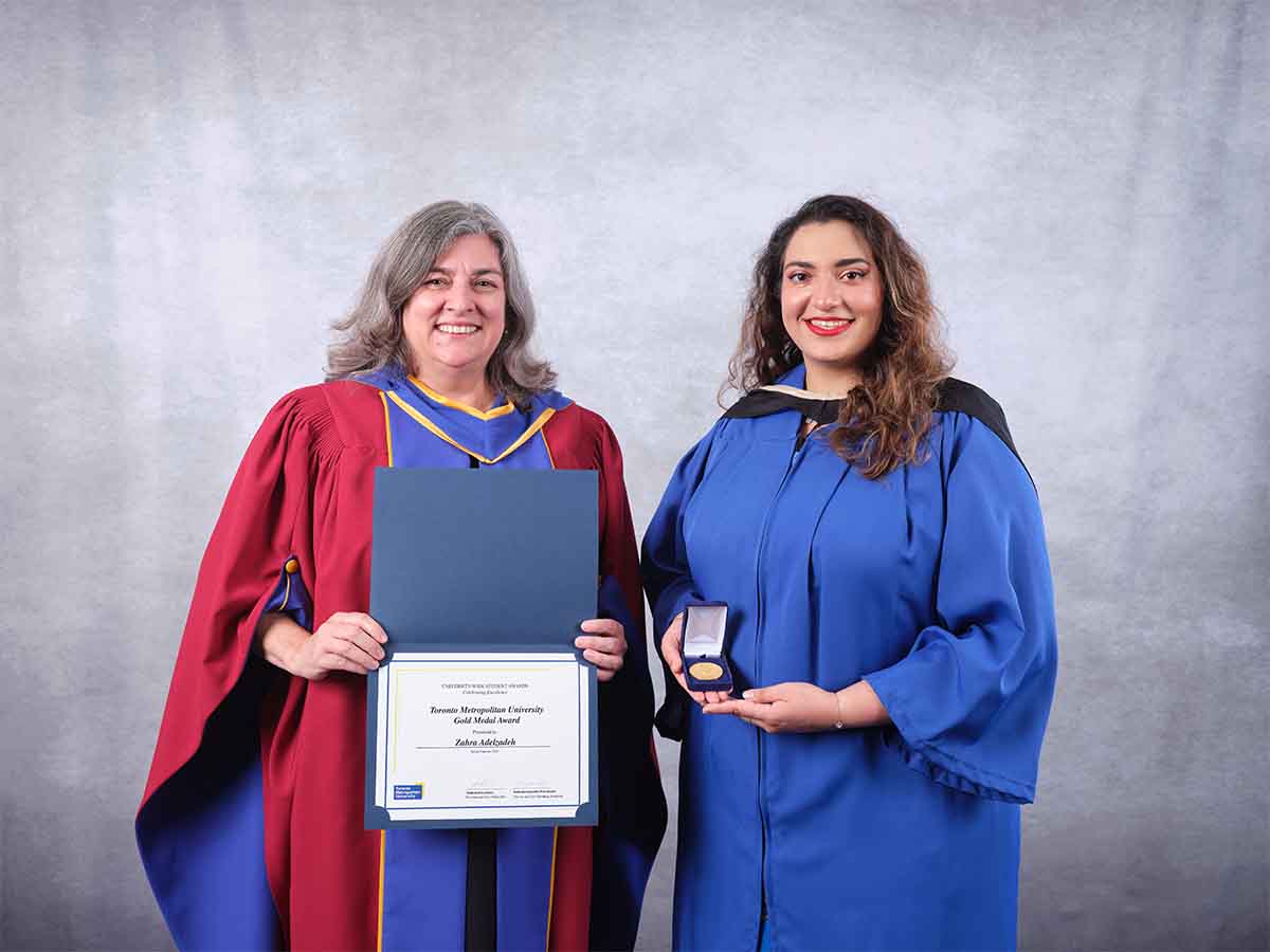 Dean Cynthia Holmes and Gold Medal winner Zahra Adelzadeh