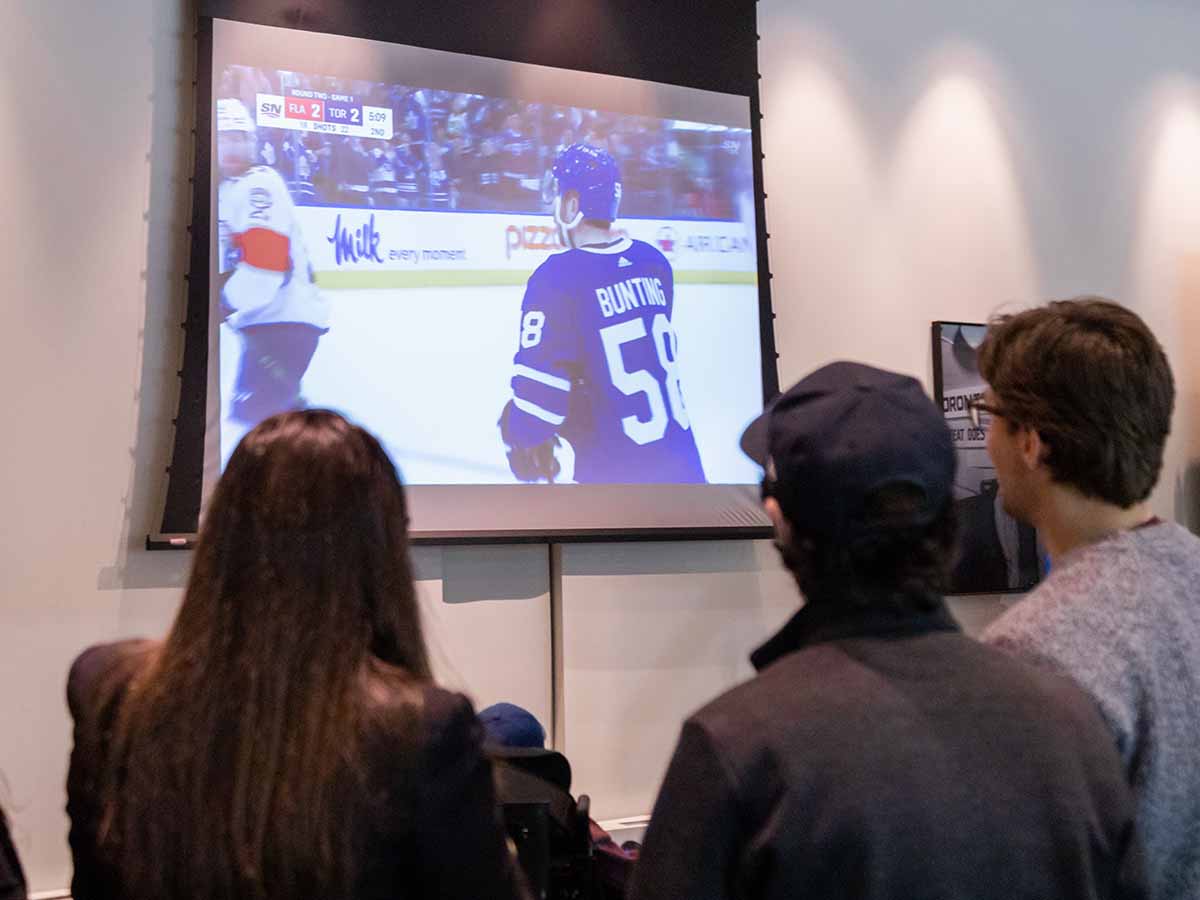 Attendees watching Toronto Maple Leafs game during the MBA Sport Leadership event