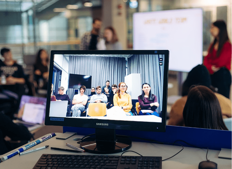 Students participating in a Zoom-recorded presentation 