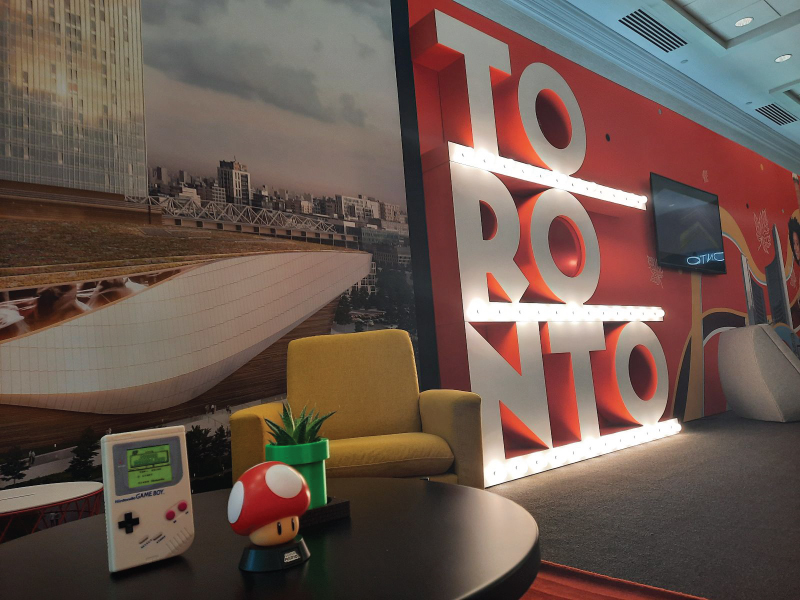 A slanted image of the word Toronto sitting on a stage in block letters