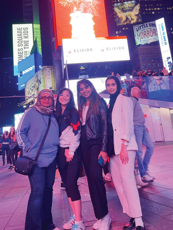 GCM students Afrah Usman, Areej Syeda and Winnie Zhan with Professor Reem El Asaleh