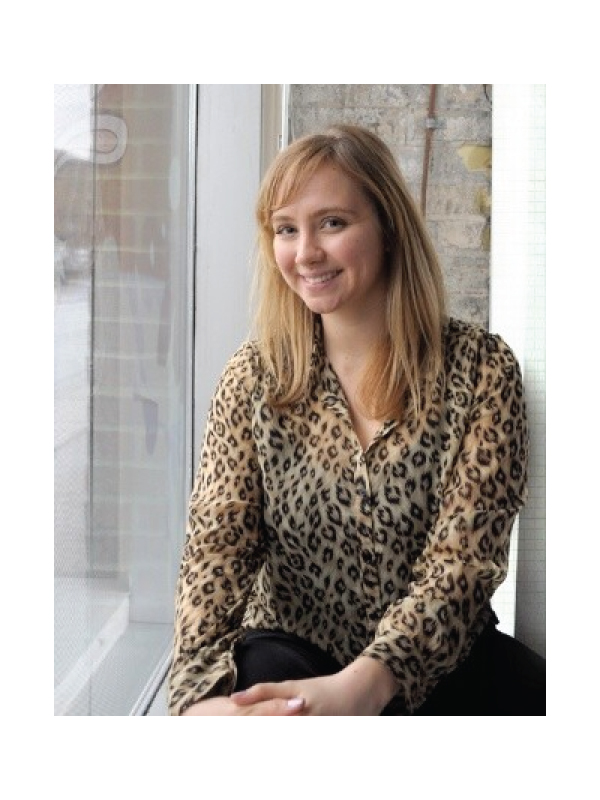 Portrait of Jennifer Bradley wearing a leopard print shirt