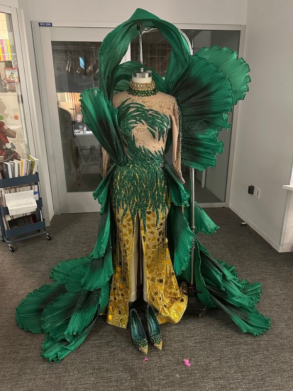 elaborate green and gold costume