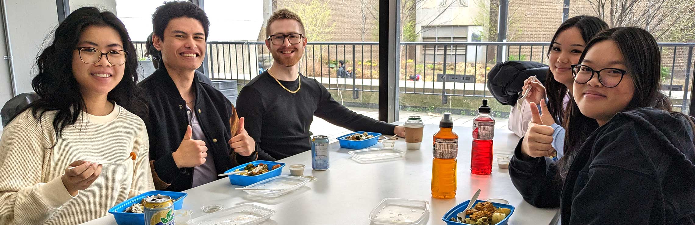 Students enjoying free food at the Hub Café