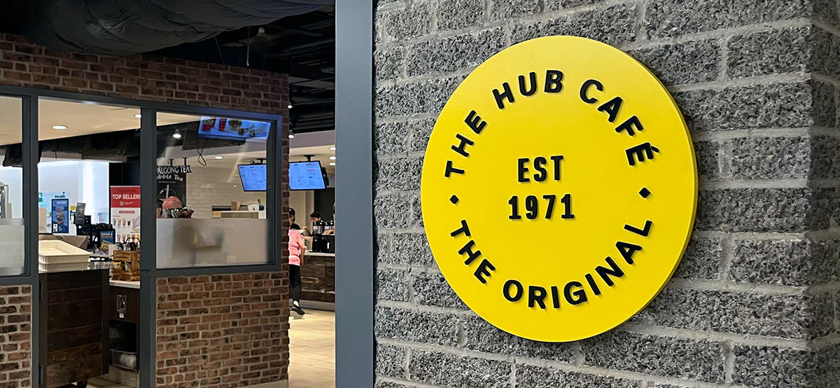 Exterior of the Hub Cafe, signage reads the Original, the Hub Cafe, Est 1971