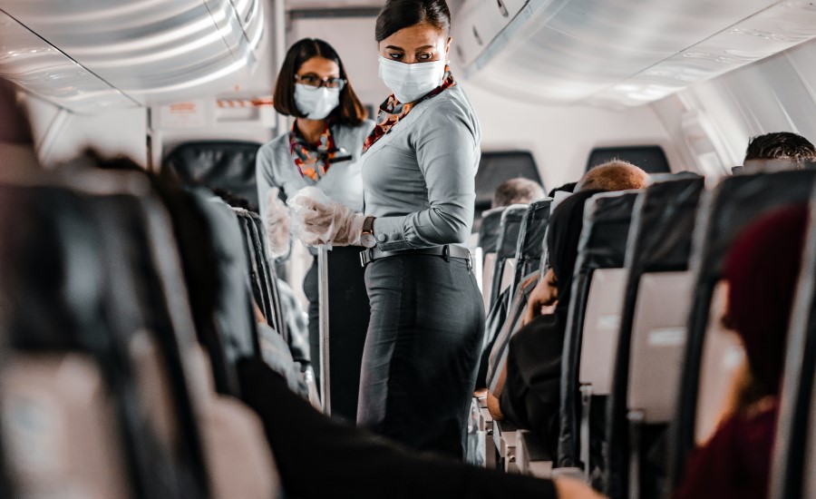 Airplane crew with face mask