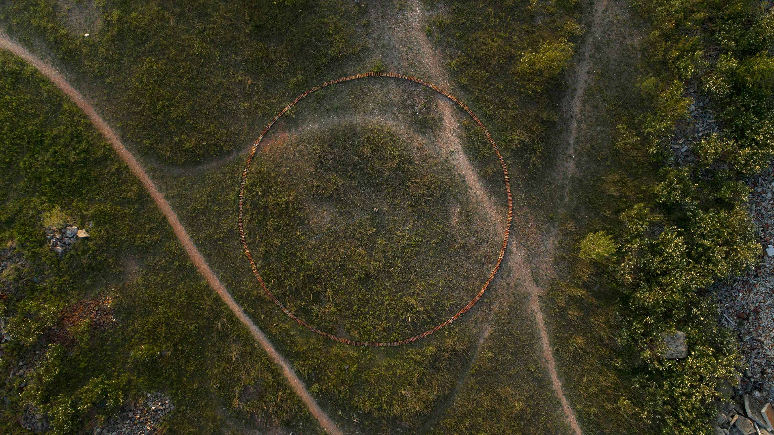 found bricks laid in 50’ circle